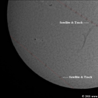 Satellites transiting the Sun